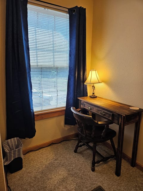Dedicated workspace in Master Bedroom.  Desk can accommodate most laptops.