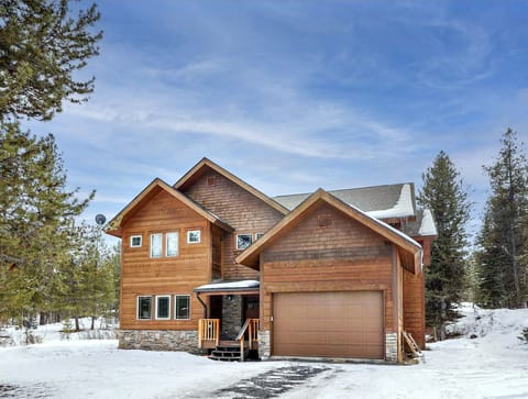 Welcome to 235 Moonridge which sits on an acre wooded lot