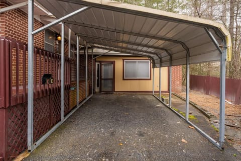 Entrance to the Studio apartment. Single carport