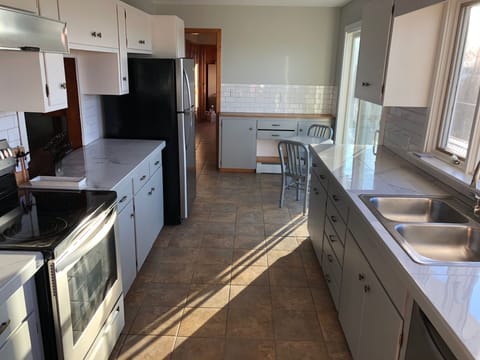 Kitchen overlooking the Mountain Range with Dining Room Passthrough