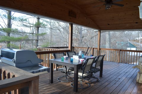 Covered porch with grill and seating