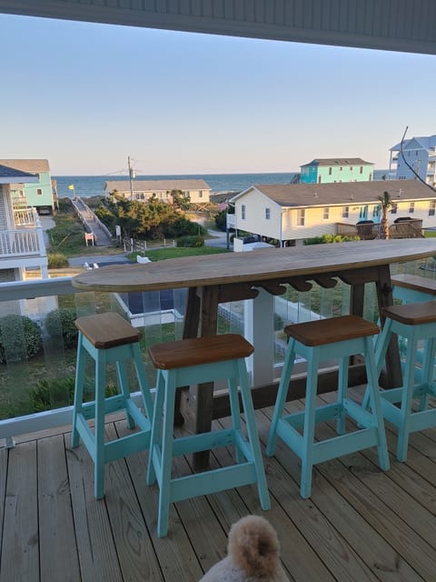surf board table for morning coffee and evening dinners.  we have so enjoyed it