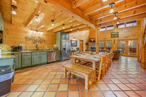 Massive Kitchen/dining area. Farmhouse table for 12. Highchair available