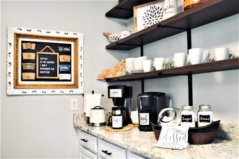 Coffee bar with a coffee maker, Keurig, ground coffee, k-cups and tea.