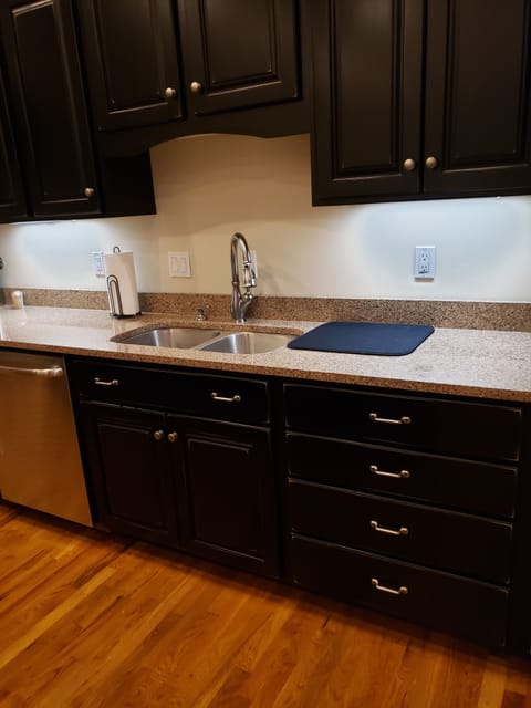 Double sink, dishwasher, garbage disposal and tons of storage.