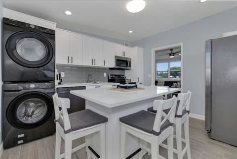 We provide washer and dryer. Detergent is in the island drawer.