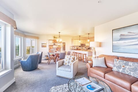 Living room seats four comfortably