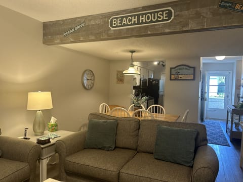 Living room facing dining area.