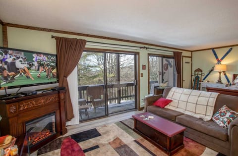 Fireplace and HD Smart TV in Cozy Living Area of Holiday Hideaway