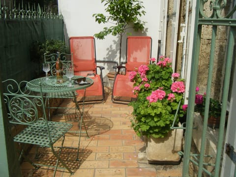 Sunny private courtyard where you can enjoy your morning croissant 