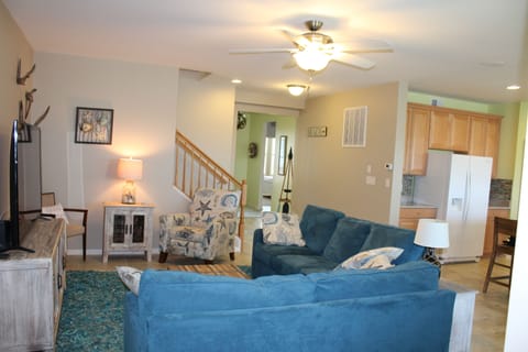 Open living space with kitchen, dining and living room