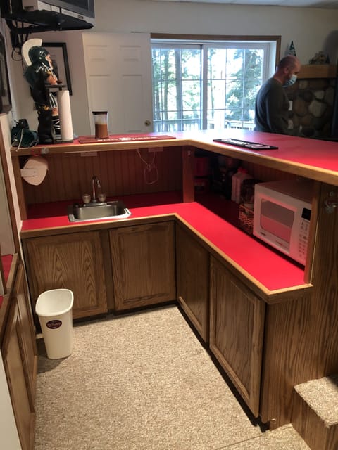 Basement bar with full refrigerator