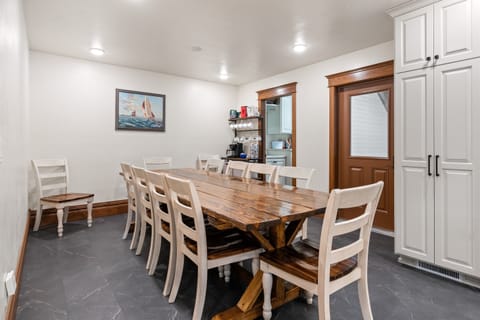 Custom built, one-of-a-kind farmhouse table. Seats 12, then 7 at the kitchen island and another 10 in the 2nd floor kitchen. Plus tons of outdoor space to eat!