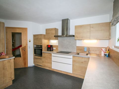 Cabinetry, Furniture, Countertop, Building, Kitchen, Wood, Interior Design, Kitchen Stove, Kitchen Appliance