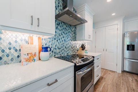 Beautiful glass tiled backsplash