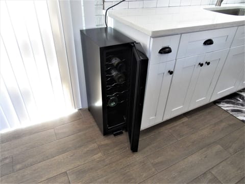 Wine chiller with complimentary wine bottle