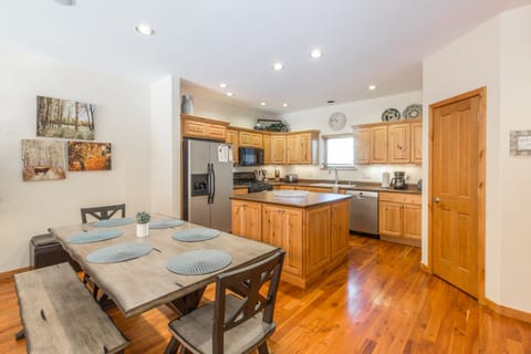 Fully-equipped kitchen with standard drip coffee pot.