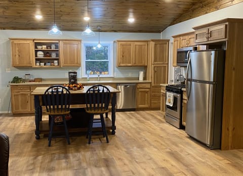 Fully stocked kitchen and Island with seating
