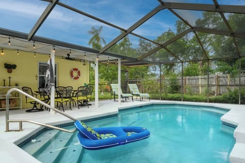 Enjoy morning coffee or an informal dinner at the pool-side table