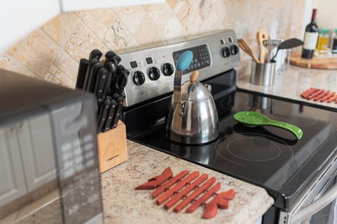 Sharp knives and ample cookware are provided.