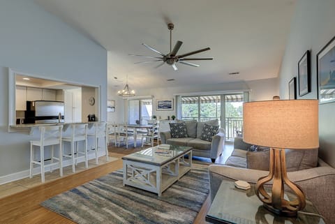 View of Kitchen Bar Seating, Dining Area, and Great Room.
Balcony view