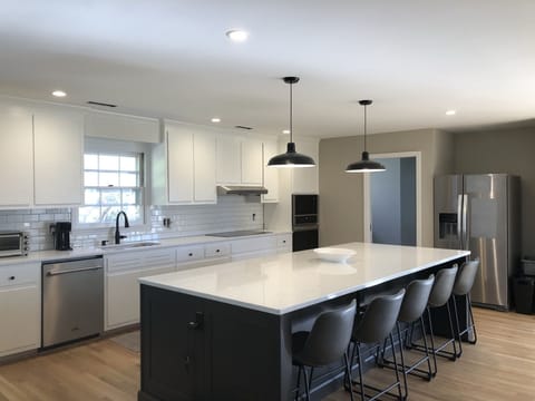 Spacious kitchen featuring huge island for gathering with your favorite people