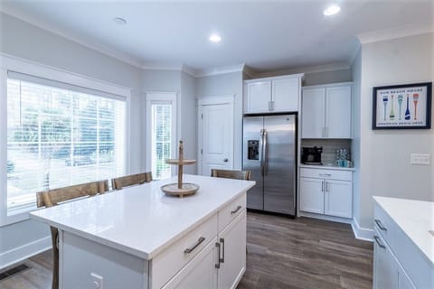 Full size Refrigerator, pantry, and coffee bar