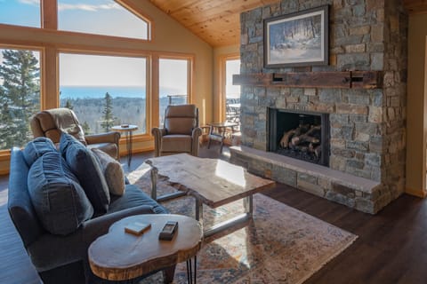 Main Floor Living Room with fully swivel recliners and a kids game table