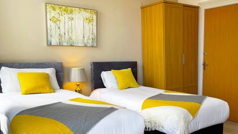 1 Double bed, 2 Single beds. 1st floor