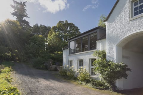 Stables within former coach house and stables of Arngomery Court