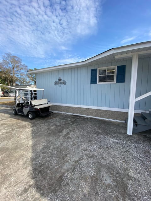 Side of house-golf cart