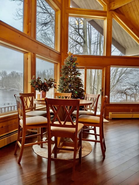 Dining room during fall/winter, overlooking lake. Song Mountain can be seen too.