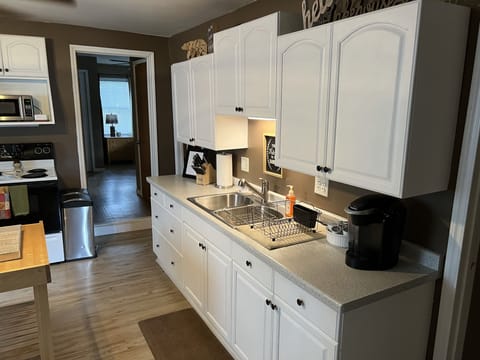 Full Kitchen
- Stove
- Microwave
- Plates, Bowls, & Silverware
- Keurig
- Basics