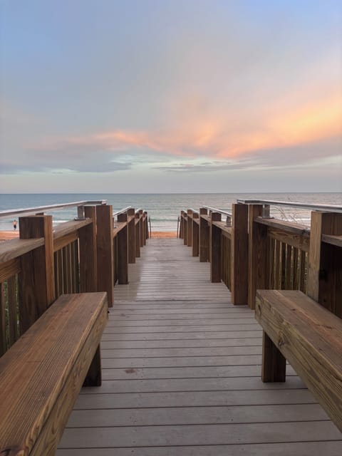 Feet away from the private- no car beach away from public crowds. New boardwalk 