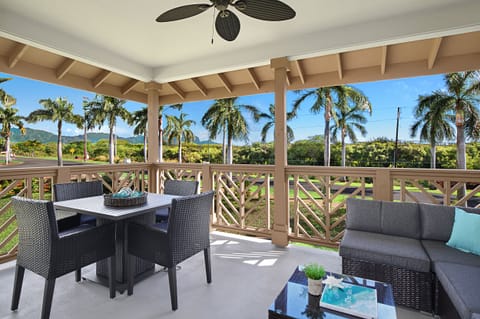 Sip your morning coffee or sunset cocktails on the covered lanai, featuring stunning views of Kauai’s lush mountains and glimpses of the ocean.