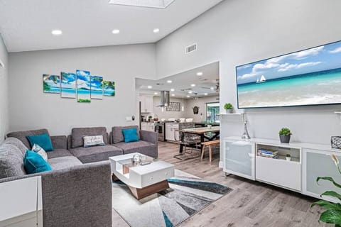 Who wouldn't love this beautiful living area with comfortable L-shaped couch? Have the best time with family and friends here! Book this property now!