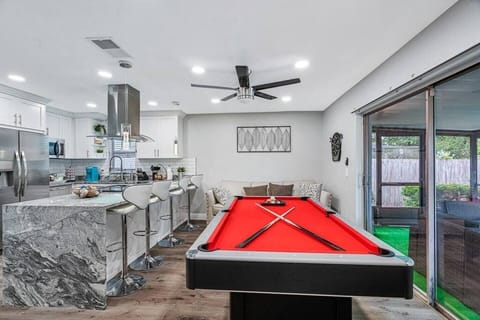 Aside from our living area, we have this amazing play area where you could enjoy playing competitive games. Our beautiful pool and ping-pong table is available for you whenever you want to play. Send us an inquiry now!