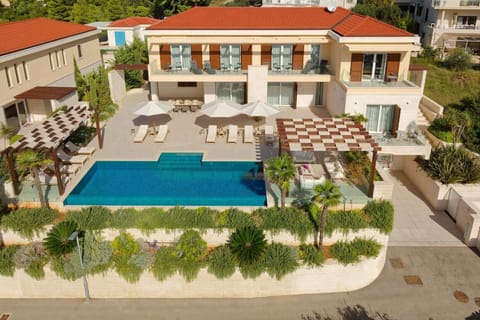 Exterior of Croatia luxury villa Deluxe Palace 1 with heated pool for vacation and rent with family