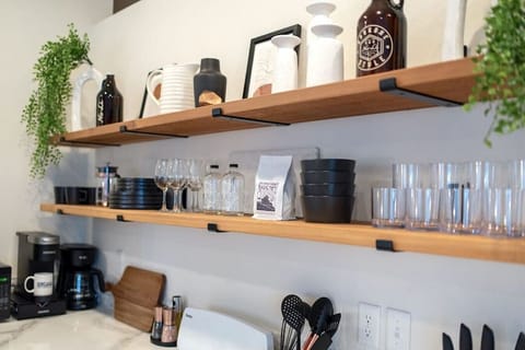 Everything you need at your fingertips: cookware, utensils, and modern appliances.