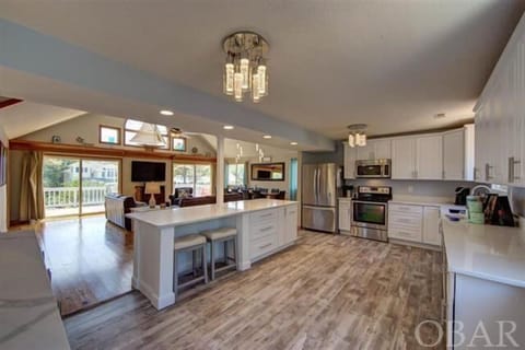 A recently updated kitchen will please all the chefs.