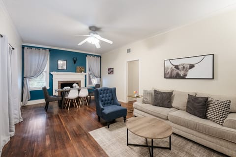 Your complete living space: Smart TV, Comfy Couch, and Dining Table with 6 chair