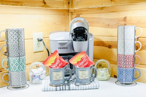 4 Start your day off on the right foot with a cup of fresh coffee made right in the comfort of your own cozy cabin. It's the perfect way to kick start your adventure-filled day!