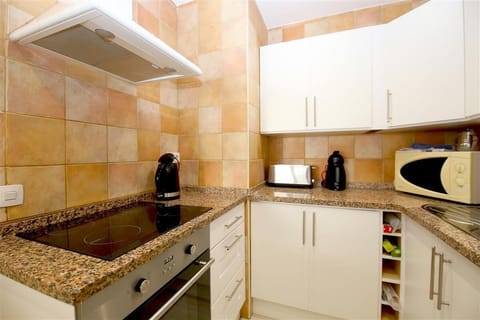 Another picture of the well-equipped kitchen in this apartment