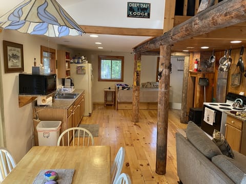 Standing in front door looking at kitchen