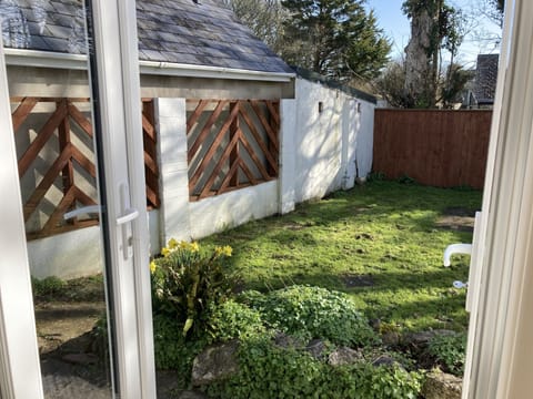 French doors leading to fully enclosed garden