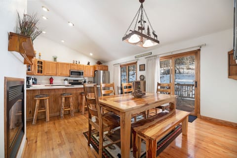 Kitchen Dinning Room with 65 in flat screen. 
