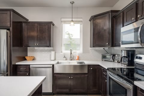 Big sink, electric stovetop. 