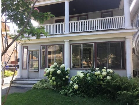 Front of the house, in the summer.