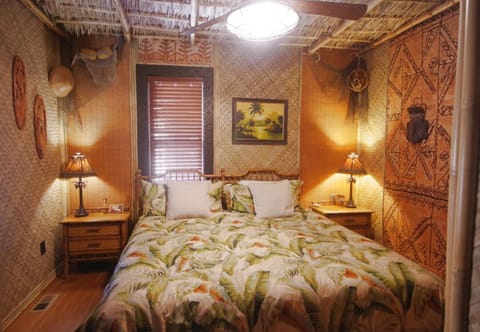 One-of-a-kind tiki bedroom with plush King sized bed