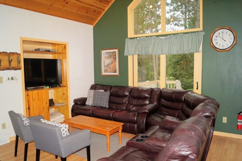 Living room is equipped with a Smart TV.